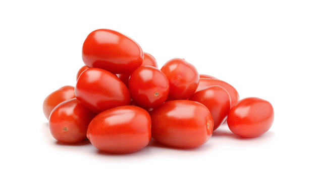 Pile of cherry tomatoes isolated on white
