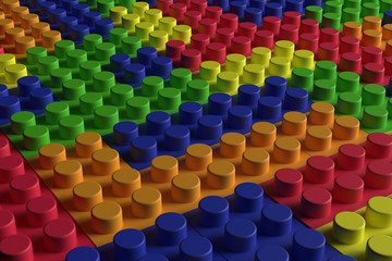 multi-colored cubes of a childrens designer laid flat