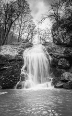 black and white image of a waterfall