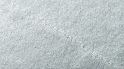 abstract background of soft blue fabric. a fragment of fluffy fabric. selective focus
