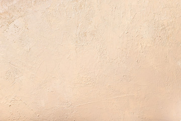 Abstract neutral beige wall. textured background. selective focus.