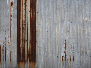  Abstract Galvanized sheet with rust as a retro pattern wall.Concept is wall banner,decorate,abstract background,material,construction.