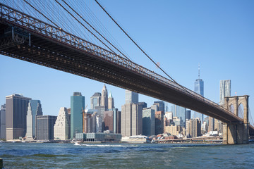 Fototapeta na wymiar All Rights View of New York City from Brooklyn Bridge Park
