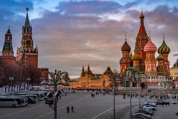 Wide angle view of the city of Moscow with Moscow Kremlin, TSUM and The Cathedral of Vasily the Blessed in winter at sunset. Travel destination Moscow, Russia