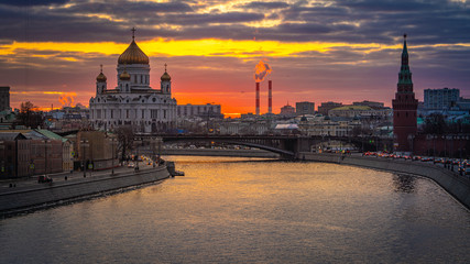 Fototapeta premium Beautiful wide angle view of the city of Moscow with Moscow River and Chris the Savior Cathedral at sunset. Travel destination Moscow, Russia