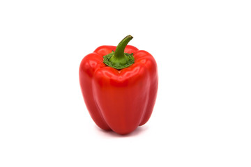 Bright red organic pepper isolated on white background.