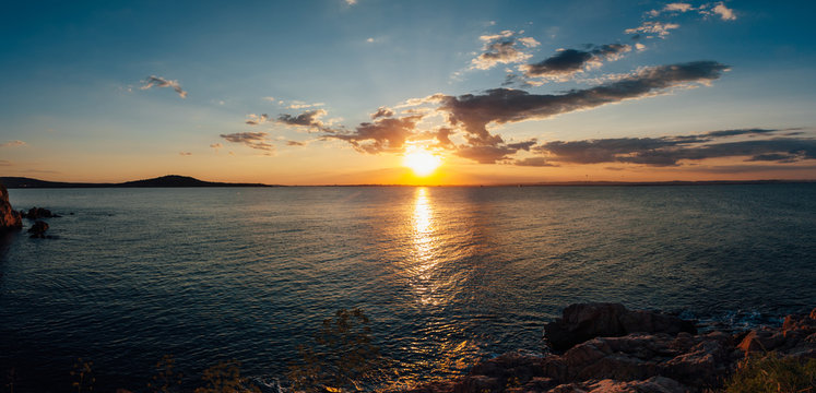 Panorama of the sunset at sea