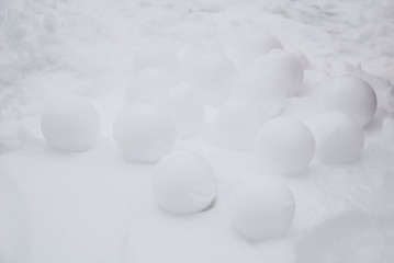 Snow balls on the ground backgrounds