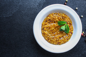 mustard cereal sauce (French or Dijon recipe) menu concept. background. top view. copy space