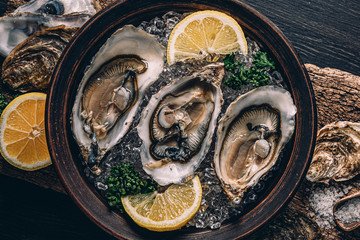 Fresh oysters with lemon ice and white wine.