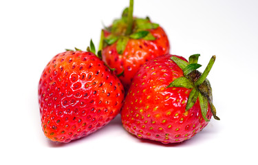 Fresh red strawberries on a white background