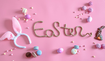Easter creative inscription on a pink background .