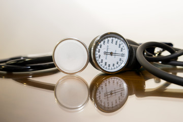 Close up stethoscope with sphygmomanometer meter for blood pressure measurement.