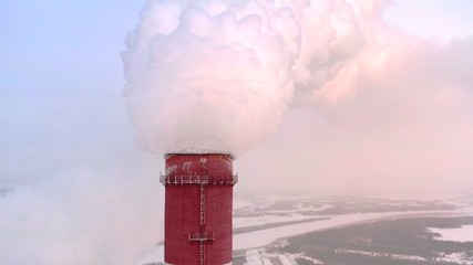 A huge Steam pillar from the power plant or factory pipe, close up.