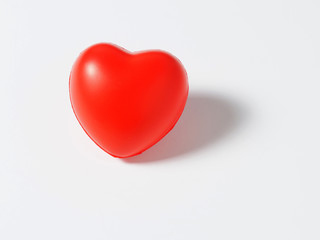 Obraz premium red heart on a white background. Concept of love, health day, Valentine's day