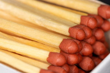 Close up of wooden matches in a cardboard box