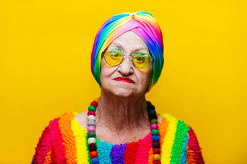 Funny grandmother portraits.granny fashion model on colored backgrounds