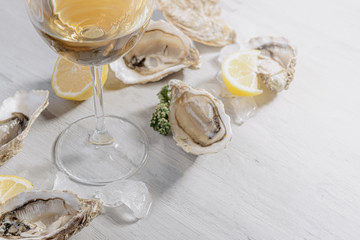 Fresh oysters with lemon ice and white wine.