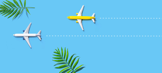 Flights booking and reservation theme with two miniature airplanes