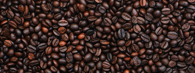 Many brown coffee beans, can be used as a background