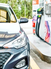Car and gas station.