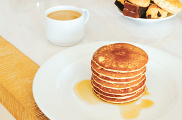 Pancakes and coffee.