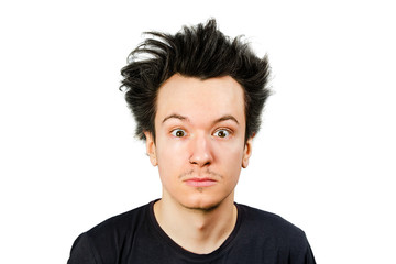 shaggy guy with long hair looks in camera, on isolated white background.