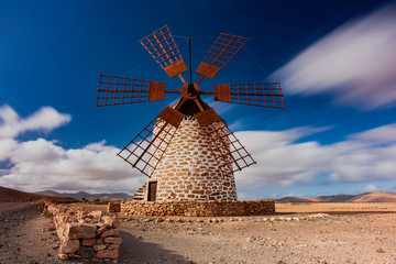 tafia windmill, fuerteventura with dreamy skies
