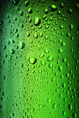 drops on a glass wine bottle