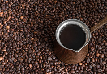  background of roasted coffee beans with turk