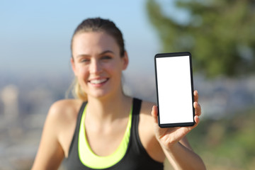 Happy runner showing blank smart phone screen