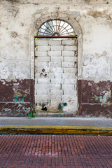 Weathered and bricked up doorway in Old Panama City