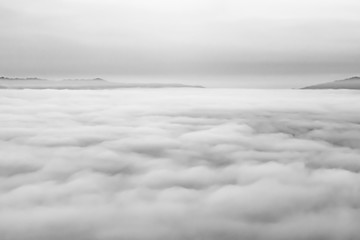 Grayscale shot of foggy in the morning at Phetchabun Thailand