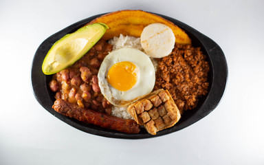 Tray Paisa, typical colombian food on white background