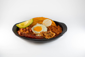 Tray Paisa, typical colombian food on white background