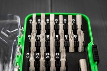 Toolbox with fixed interchangeable screwdriver tips