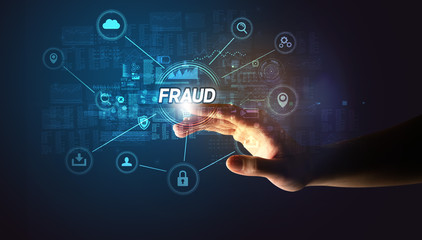 Obraz premium Hand touching FRAUD inscription, Cybersecurity concept