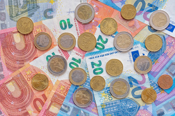 Paris, France - 02 15 2020: Range of euro banknotes and coins