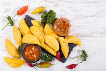 Empanadas with hot sauce, traditional Colombian food