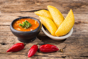 Empanadas with hot sauce, traditional Colombian food
