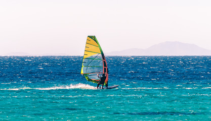 one surfer rides in the Red Sea in Egypt
