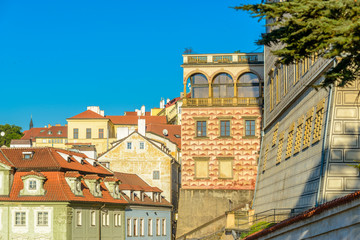 Top view to red roofs and blue sky skyline of Prague city Czech republic.
