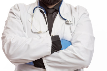 Male doctor in a white coat with a stethoscope and gloves. White background.