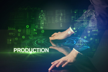 Businessman touching huge display with PRODUCTION inscription, modern technology concept