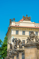 Obraz premium View of the top of old buildings with red roof and blue sky at Prague city Czech republic.
