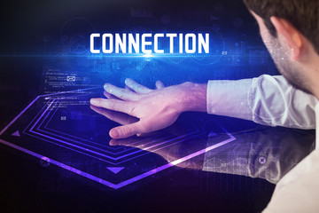 Hand touching digital table with CONNECTION inscription, new age security concept