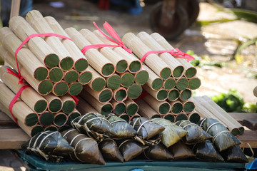 Traditional local Vietnamese food made of rice cooked in a bamboo and called Com Lam