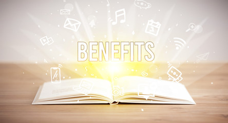 Opeen book with BENEFITS inscription, business concept