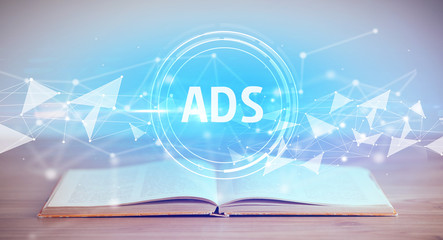 Open book with ADS abbreviation, modern technology concept