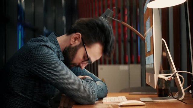 Tired Worker Overworked On Computer.Frustrated Businessman Working Alone.Office Worker Overtime Work In Internet.Workaholic  Deadline.Tired Businessman Works In Night Office.Overwhelmed Stressed Man.